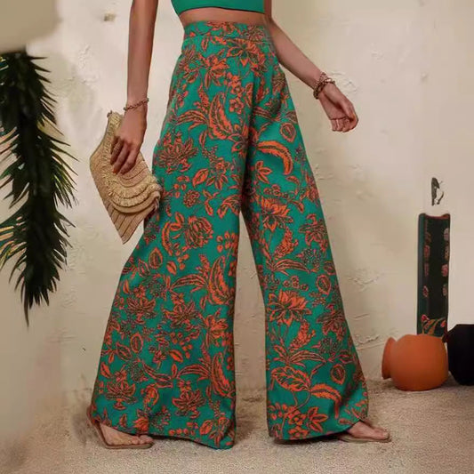 Pantaloni eleganți cu imprimeu floral și croi larg de Cristina Gore