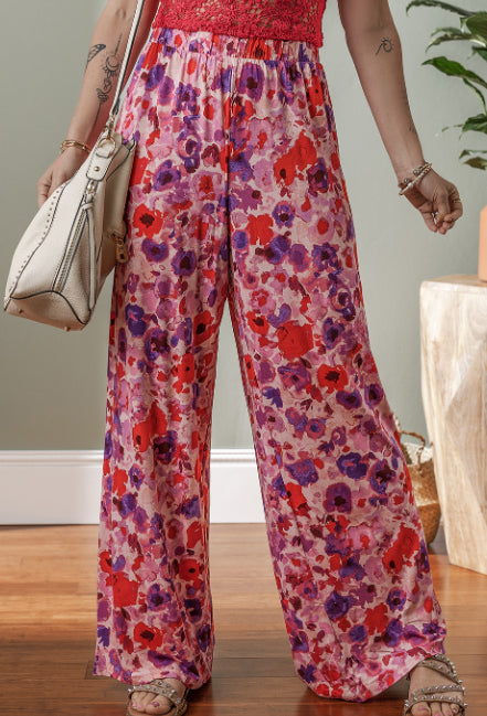 Pantaloni cu talie înaltă și imprimeu floral vibrant de Cristina Gore