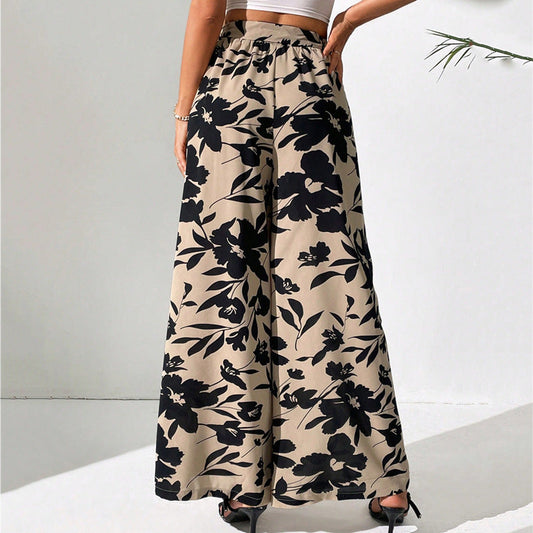 Pantaloni largi cu talie înaltă și imprimeu floral de Cristina Gore