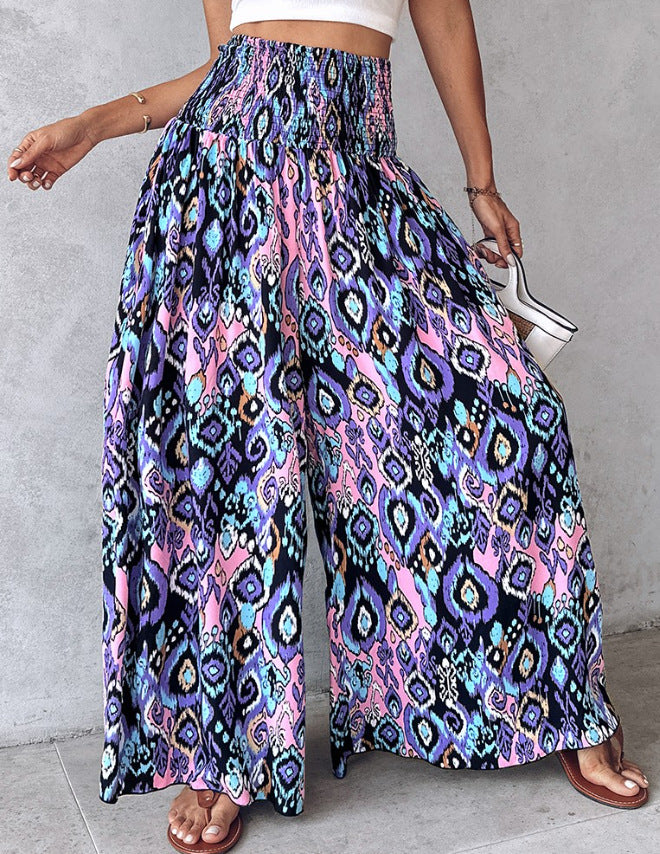 Pantaloni retro florali cu picior larg de Cristina Gore