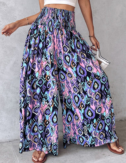 Pantaloni retro florali cu picior larg de Cristina Gore