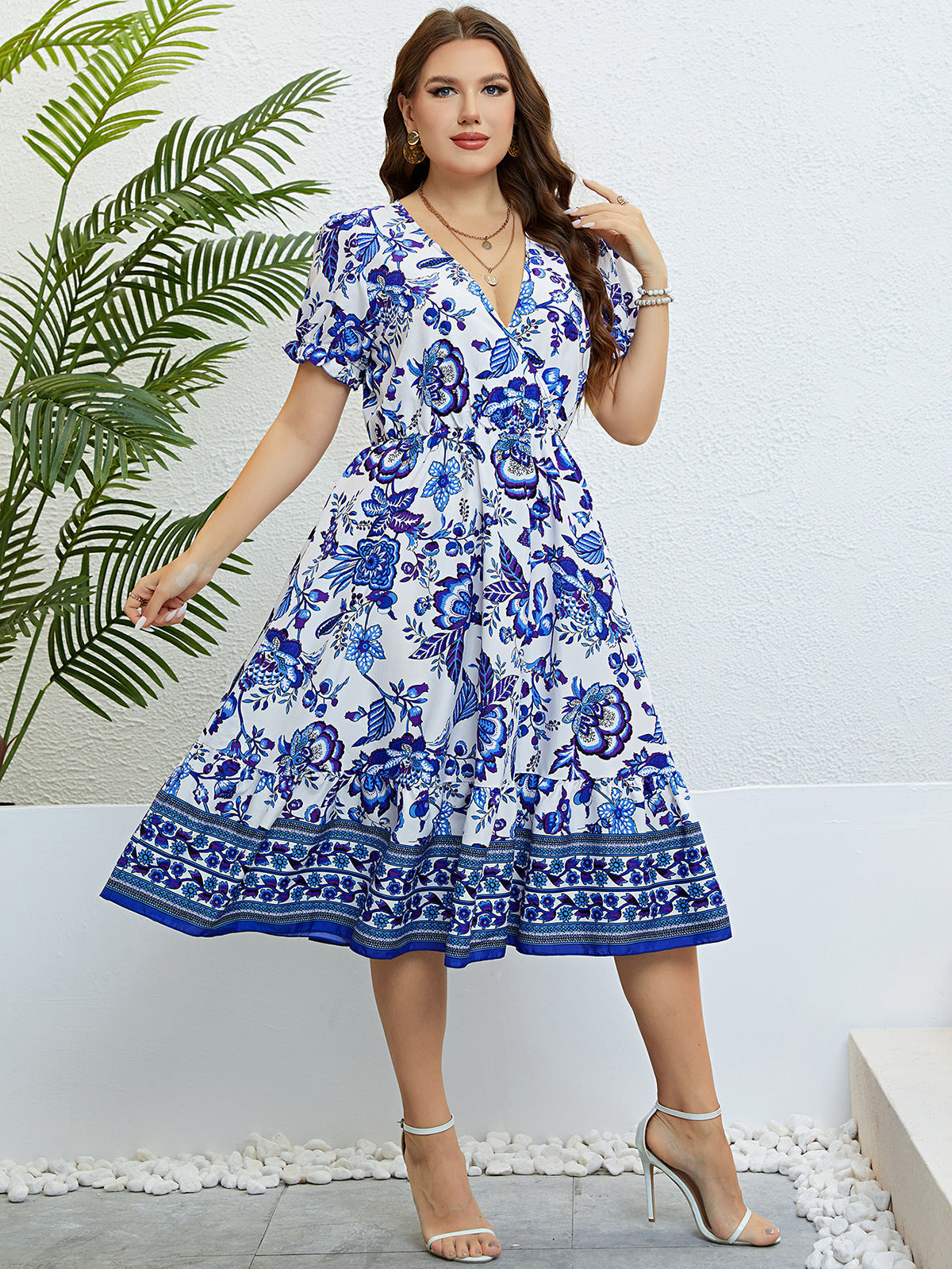 Rochie midi cu decolteu în V și imprimeu floral de Cristina Gore