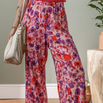 Pantaloni cu talie înaltă și imprimeu floral vibrant de Cristina Gore