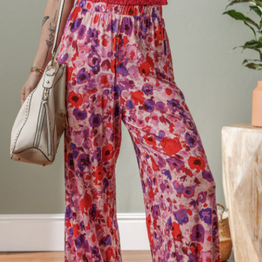 Pantaloni cu talie înaltă și imprimeu floral vibrant de Cristina Gore