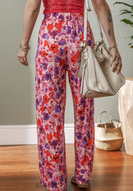 Pantaloni cu talie înaltă și imprimeu floral vibrant de Cristina Gore