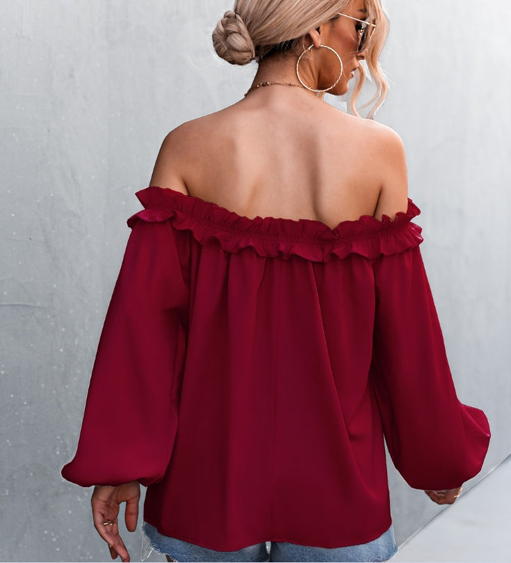 Top elegant cu mâneci tip felinar, fără umeri, de la Cristina Gore