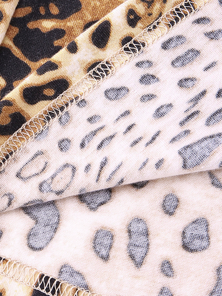 Top cu imprimeu leopard și decolteu în V de Cristina Gore