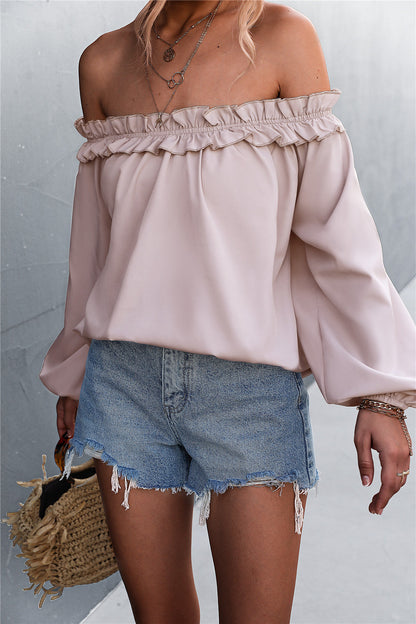 Top elegant cu mâneci tip felinar, fără umeri, de la Cristina Gore