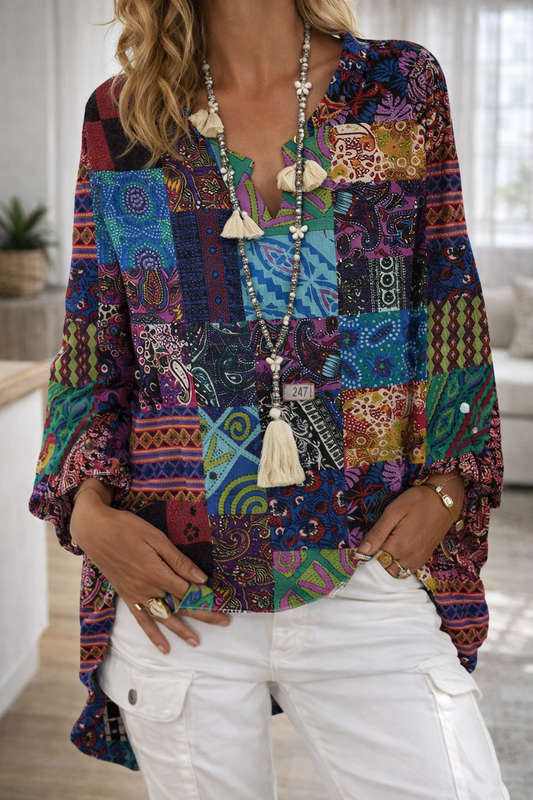 Top cu imprimeu vibrant și decolteu în V de la Cristina Gore