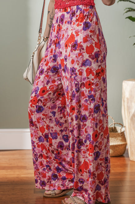 Pantaloni cu talie înaltă și imprimeu floral vibrant de Cristina Gore