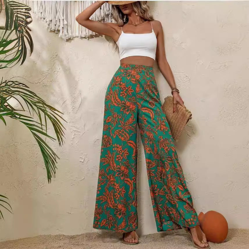 Pantaloni eleganți cu imprimeu floral și croi larg de Cristina Gore