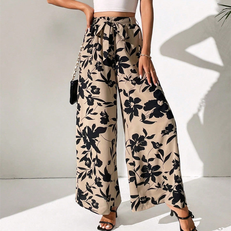 Pantaloni largi cu talie înaltă și imprimeu floral de Cristina Gore