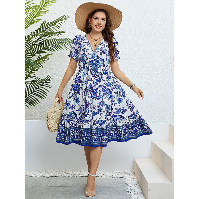 Rochie midi cu decolteu în V și imprimeu floral de Cristina Gore