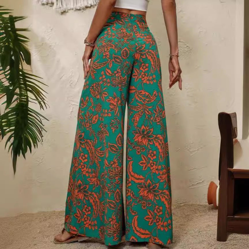 Pantaloni eleganți cu imprimeu floral și croi larg de Cristina Gore